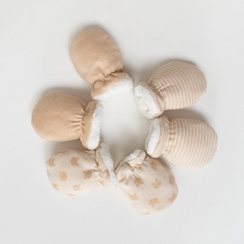 Petites moufles bébé en pur coton blanc uni anti-grattage